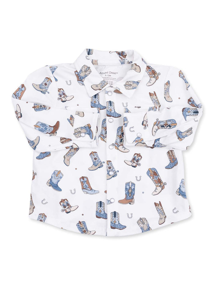 White toddler shirt with cowboy boot pattern, featuring buttons and a collar. Ideal for casual or themed outfits.