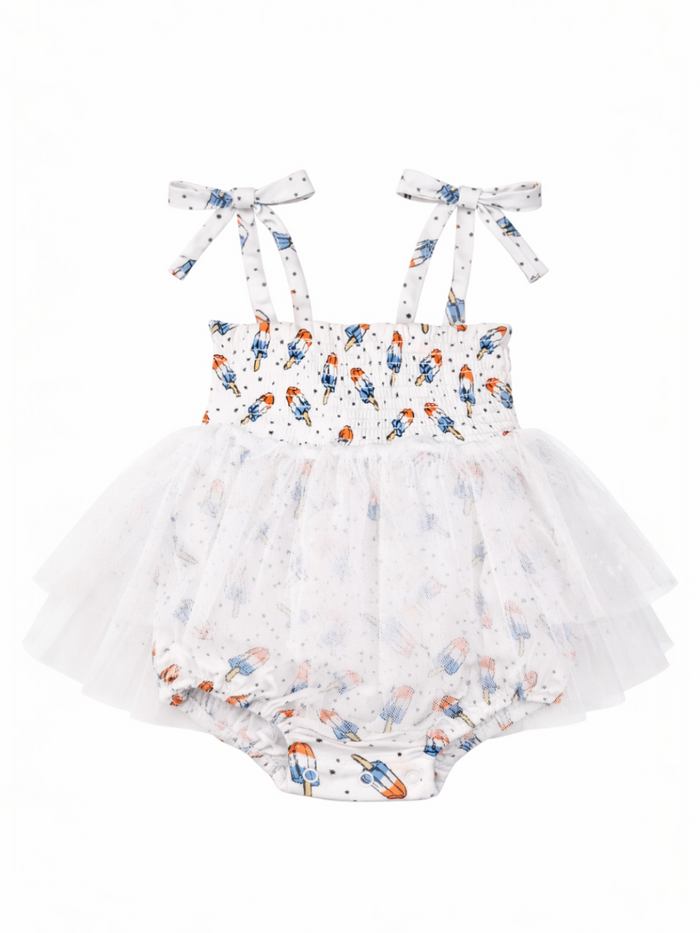 White dress with rocket pattern, tulle skirt, and bows on straps, ideal for infants or toddlers.