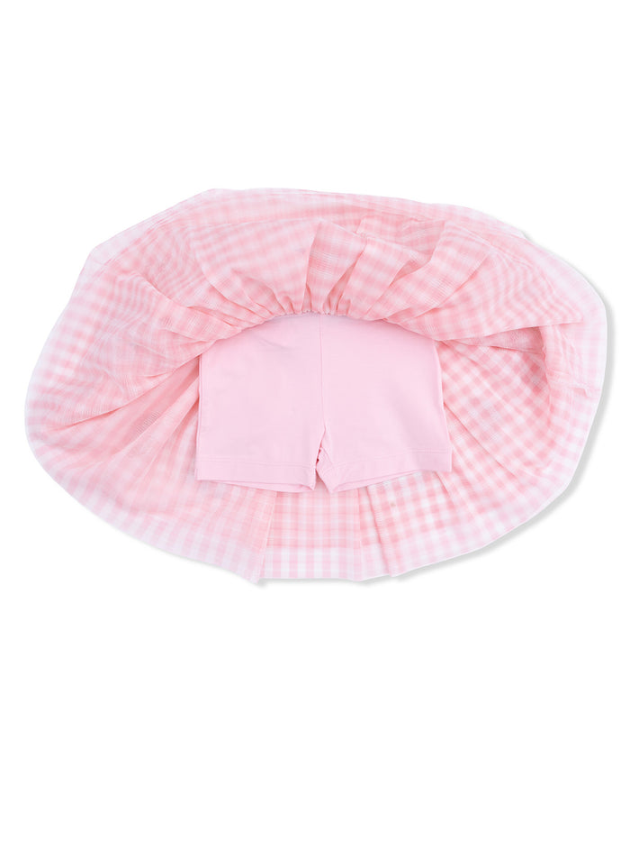 Pink gingham dress with built-in shorts, displayed from above on a white background.