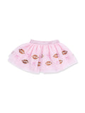 Pink tutu skirt with football and ribbon patterns, ideal for playful and sporty occasions.