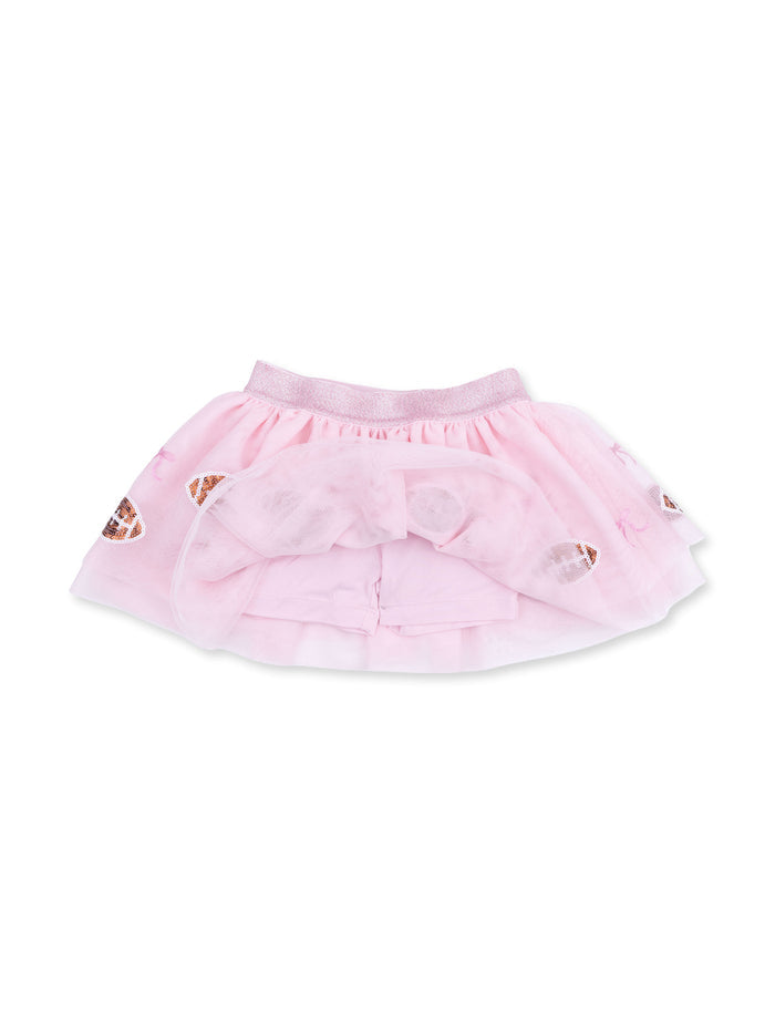 Pink tulle skirt with a shiny waistband and playful embroidered designs. Perfect for a special occasion or everyday wear.