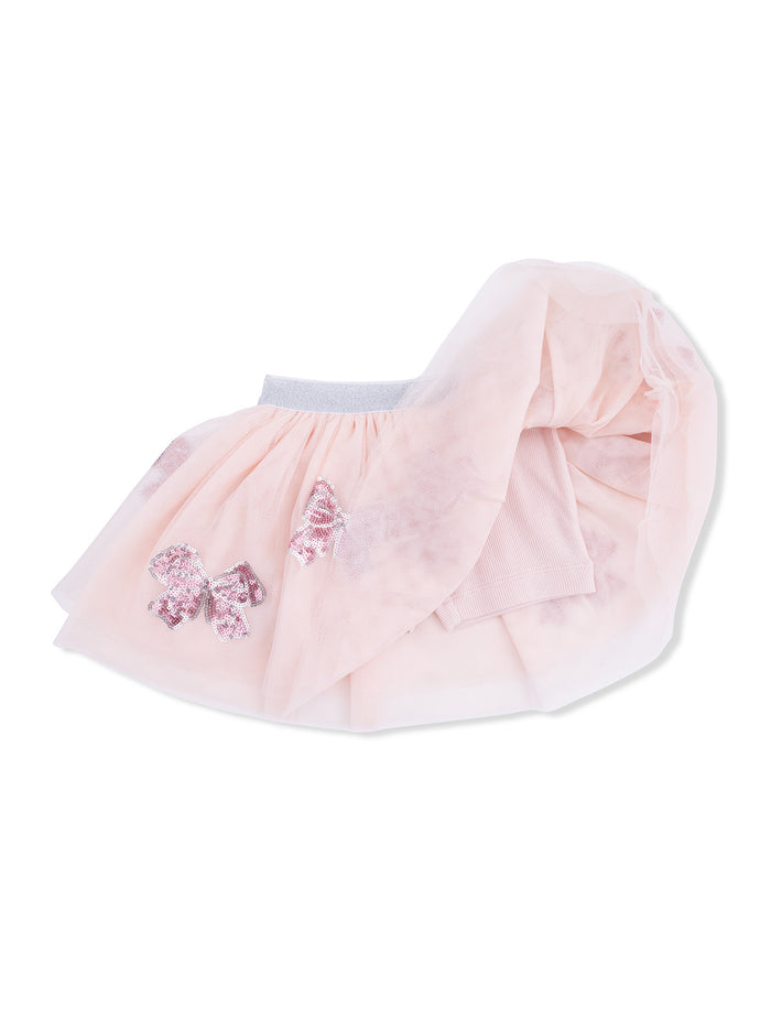 Light pink tulle skirt with sparkly bows and a soft elastic waistband.