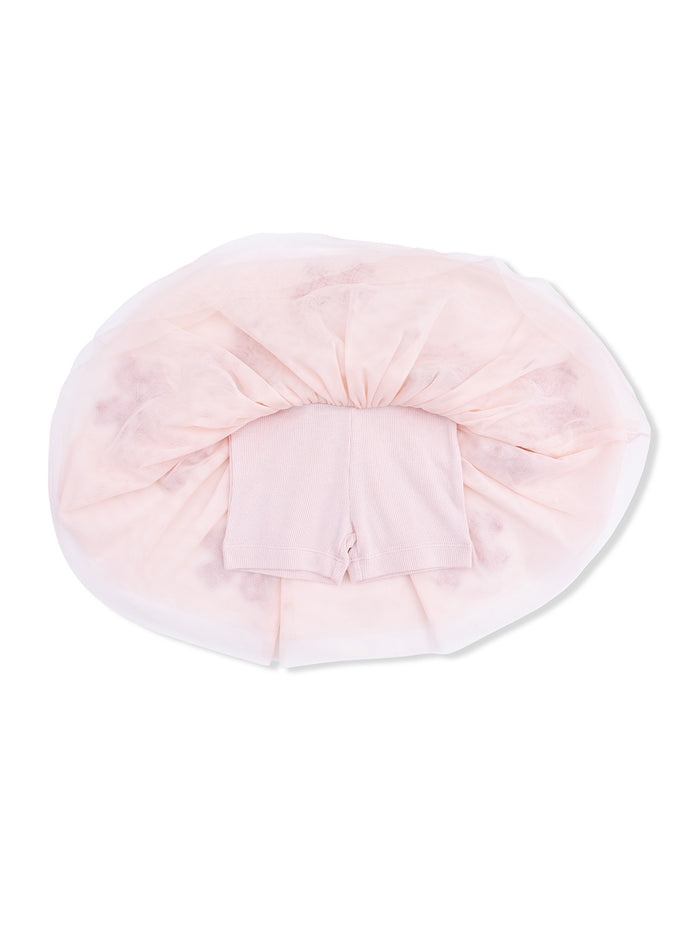 Pink tutu with integrated shorts, arranged in a circular shape against a white background.
