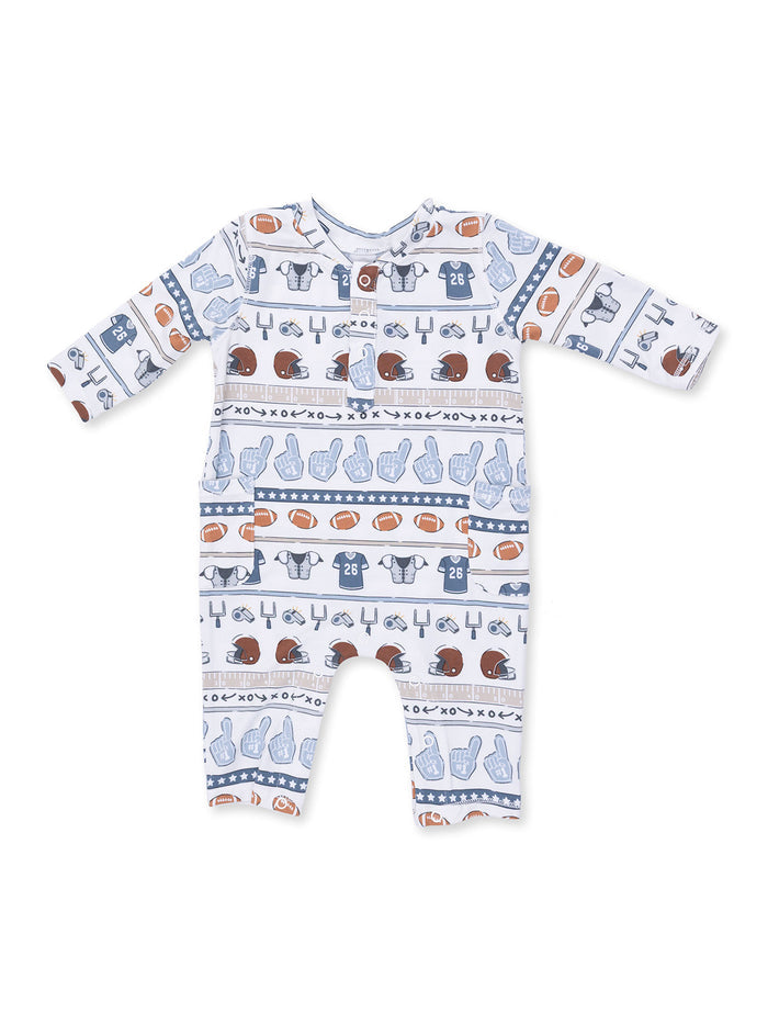 Baby romper with playful sports-themed print, featuring helmets, jerseys, and footballs in blue and brown colors.