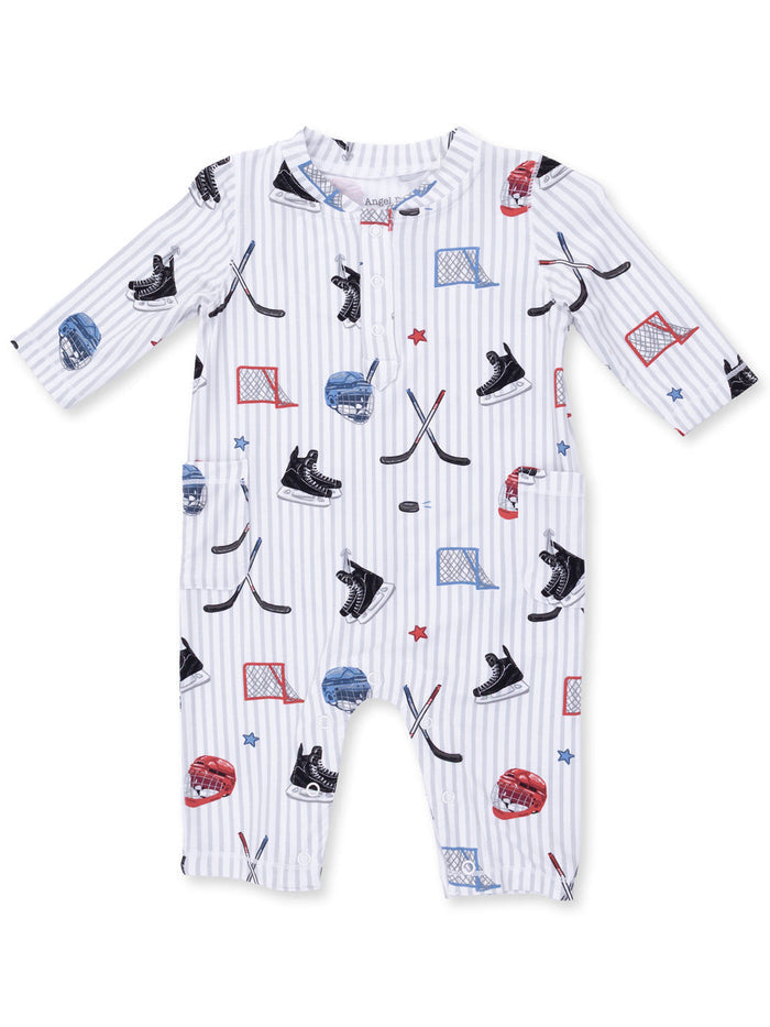 White striped onesie featuring hockey-themed graphics like pucks, skates, and helmets in blue and red.
