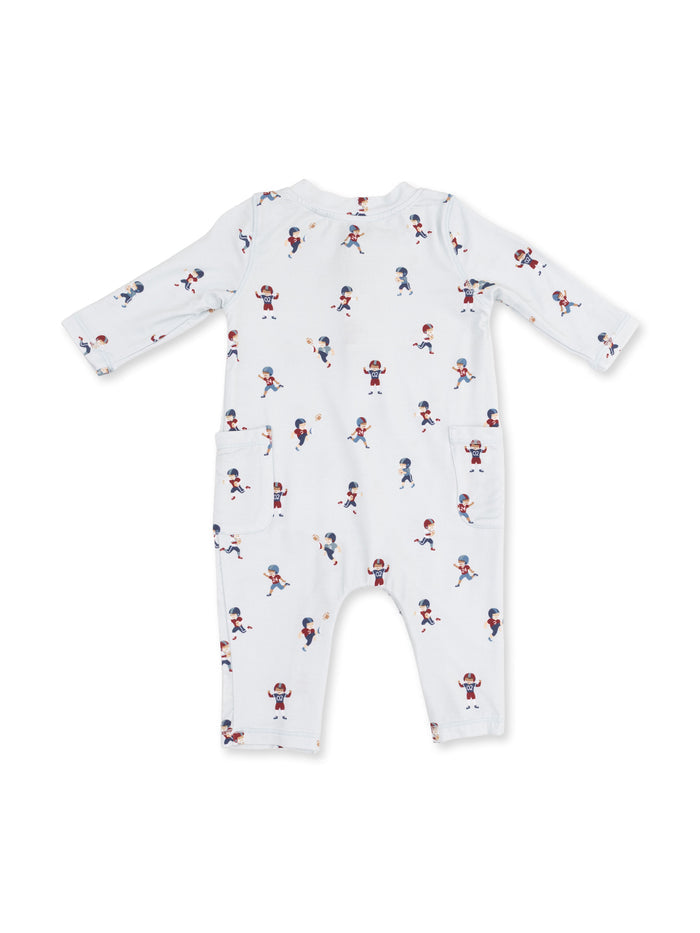 White children's romper featuring playful football player prints. Ideal for active infants and toddlers.