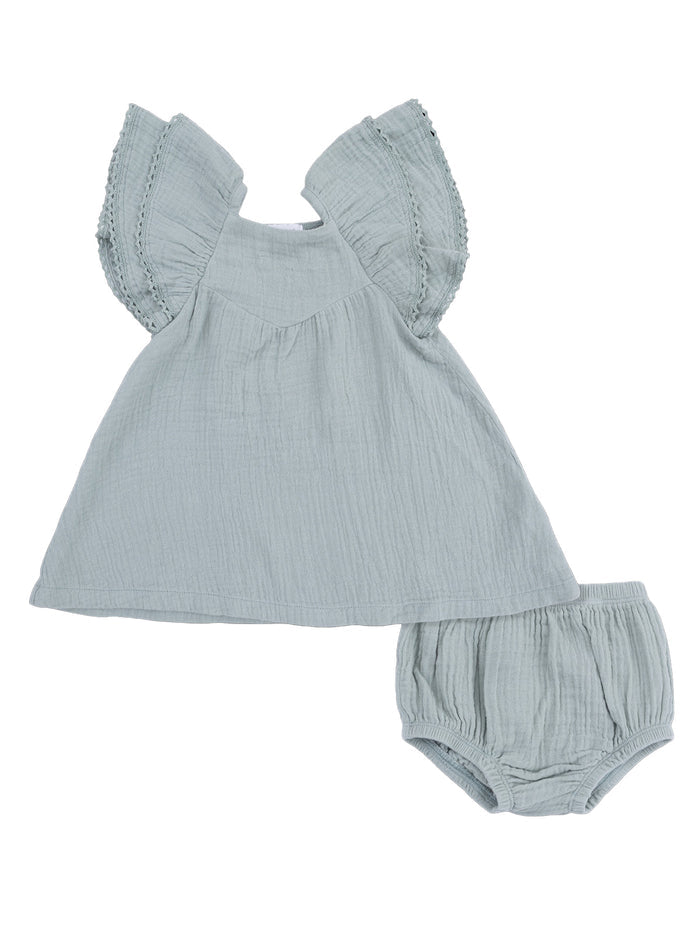 Light blue toddler outfit with ruffled sleeves and matching bloomers, made from soft, textured fabric.