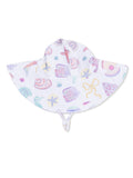 White sun hat with colorful seashell and sea creature patterns, featuring a wide brim and chin ties.