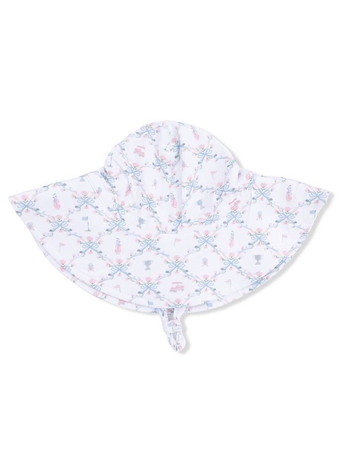 Children's sun hat with a playful pattern of ribbons, trophies, and flags on a light background.