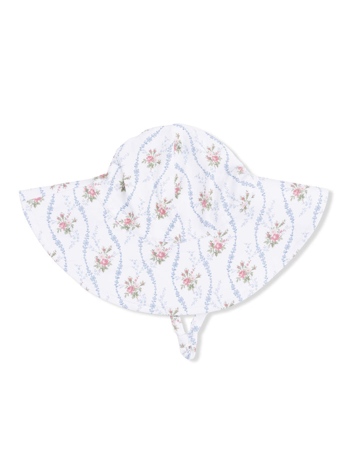 Floral sun hat with wide brim featuring a white background and pink and blue floral patterns.