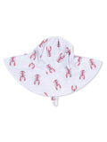Wide-brimmed sun hat featuring a red lobster pattern on a light striped background.