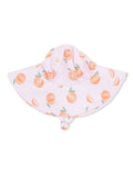 Pink hat with peach patterns and a wide brim, perfect for sun protection.