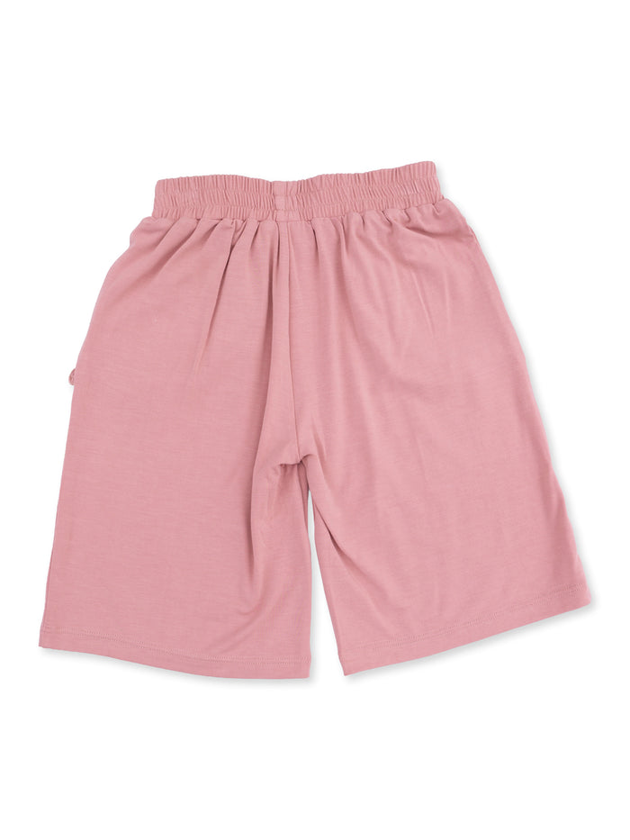 Pink shorts with an elastic waistband, viewed from the back.