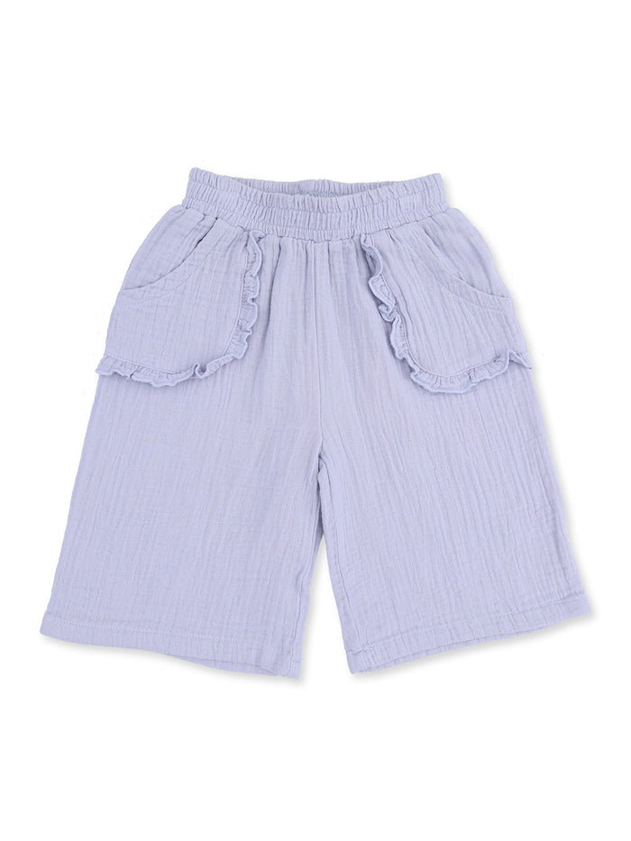 Light purple, ruffled shorts with two pockets, suitable for casual wear. Ideal for warm weather comfort.