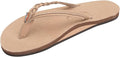 Beige sandal with a brown sole on a white background
