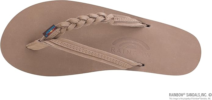 brown sandal with a brown sole on a white background
