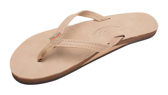 Beige sandal with a small logo on a white background