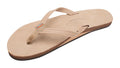 Beige sandal with a small logo on a white background